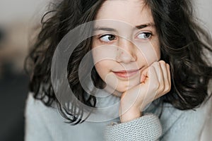 Close-up portrait of a charming European girl of 8 years old.