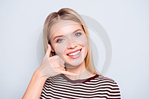 Close up portrait of charming young lady with beaming smile in s