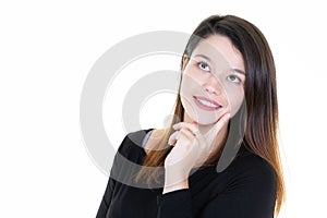 Close up portrait of a cheerful young woman looking up away