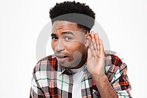 Close up portrait of a curious afro american man