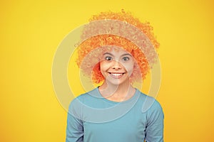 Close up portrait of the cute clown girl. Happy teenager portrait. Smiling girl.