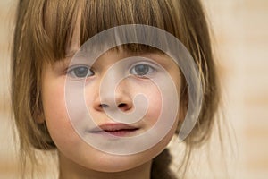 Close-up portrait of cute little girl