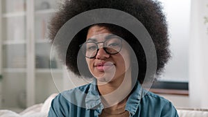 Close up portrait ethnic African American woman female girl lady looking away look at camera smiling happy friendly