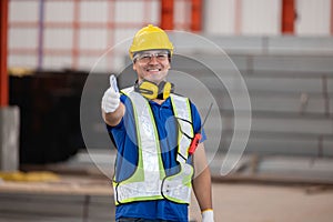 Close up portrait of factory worker pose in the steel factory