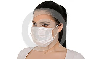 Close up portrait of female doctor or nurse wearing protective mask