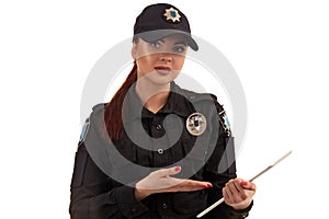 Close-up portrait of a female police officer is posing for the camera isolated on white background.