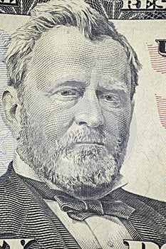 close-up portrait on a fifty dollar bill