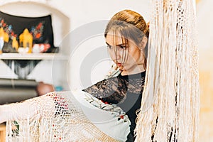 Close up of a portrait of focused flamenco woman dancer