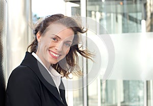 Close up portrait of a friendly business woman smiling