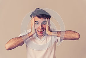 Close up portrait of funny man surprised and happy celebrating victory and wining team or lottery