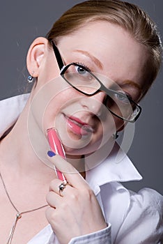 Close-up portrait of a girl with a lip gloss