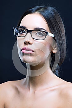 Close up portrait of a girl with optical glasses photo