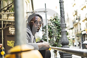 Close-up portrait of a handsome African-American man with outdoor sunglasses