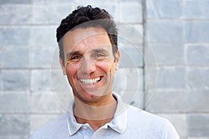 Close up portrait of a handsome older man smiling