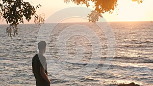 Close up portrait of handsome young man looking thoughtful pensive on seaside background.