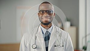 Close Up Portrait of Happy African American Family Medical Doctor in Glasses in Health Clinic