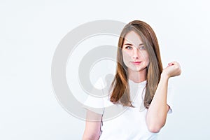 Close up portrait of Happy brunette caucasian smiling young woman looking at camera and posing isolated over white background. Bod
