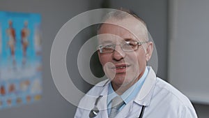 Close Up Portrait of Happy Family Medical Doctor in Glasses in Health Clinic. Successful Physician in White Lab Coat