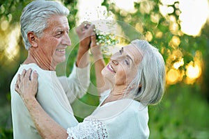 Close up portrait of happy senior couple dancing