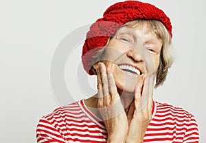 Close up portrait of happy senior woman smiling