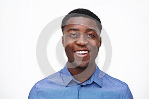 Close up portrait of happy young african american man against isolated white background