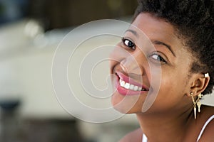 Close up portrait of a happy young black woman