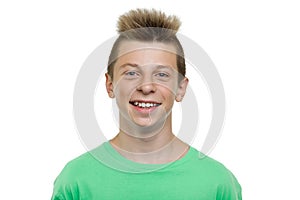 Close-up portrait of happy young laughing teenager boy, smile with teeth, white background isolated