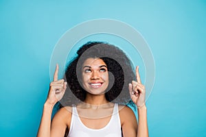 Close-up portrait of her she nice attractive glad cheerful confident wavy-haired girl pointing two forefingers up advice