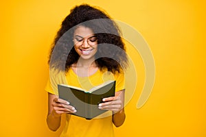 Close-up portrait of her she nice attractive lovely brainy cheerful cheery wavy-haired girl reading novel visit library