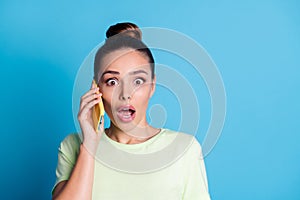 Close-up portrait of her she nice attractive lovely charming worried tanned stunned girl talking on phone with