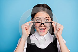 Close-up portrait of her she nice attractive pretty brainy cheerful cheery schoolgirl nerd geek touching specs good news