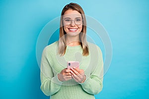 Close-up portrait of her she nice-looking attractive lovely pretty cheerful cheery girl using digital device spending