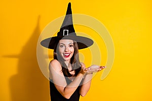 Close-up portrait of her she nice-looking attractive pretty cheerful lady wizard holding on palms copy space gift