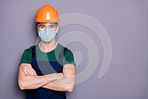 Close-up portrait of his he attractive healthy guy workman wearing safety gauze protective mask glasses mers cov