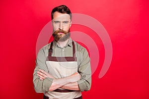 Close-up portrait of his he nice attractive angry disappointed depressed bearded guy small factory shop owner folded