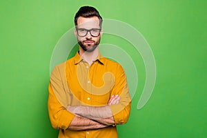 Close-up portrait of his he nice attractive calm content intelligent bearded guy in casual formal shirt office worker