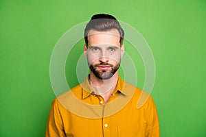 Close-up portrait of his he nice attractive calm serious guy wearing casual formal shirt modern look haircut isolated on