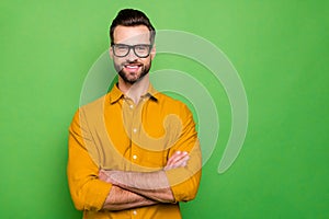 Close-up portrait of his he nice attractive cheerful cheery bearded guy in casual formal shirt office employee folded