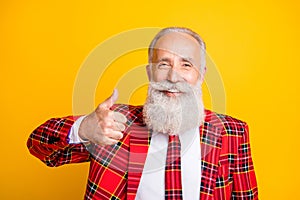 Close-up portrait of his he nice attractive cheerful cheery gray-haired man in checked blazer showing thumbup ad advert