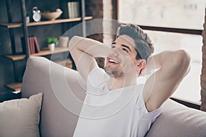 Close-up portrait of his he nice attractive dreamy cheerful cheery muscular virile guy dreaming resting fantasizing at