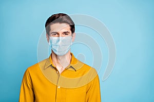 Close-up portrait of his he nice attractive healthy guy wearing safety mask stop influenza mers cov therapy symptom