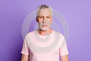 Close-up portrait of his he nice attractive serious content grey-haired man wearing pink pastel tshirt isolated over