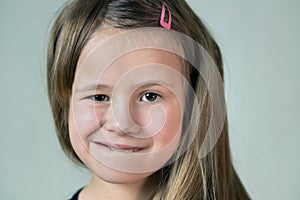 Close up portrait of little child girl with funny face expression