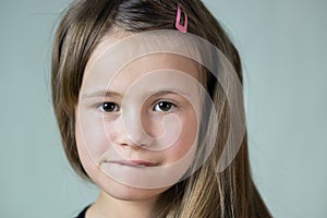 Close up portrait of little child girl with funny face expression