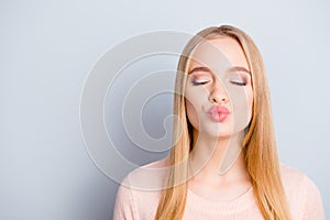 Close up portrait of lovely cute sweet adorable glad nice attractive beautiful stunning gorgeous girl sending giving a kiss to ca