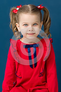 Close up portrait of lovely little blonde girl