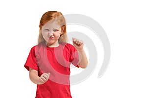 Close-up portrait mad young girl about to have nervous atomic breakdown, fist up in air, angry with someone isolated