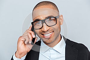 Close-up portrait of a man talking on mobile phone