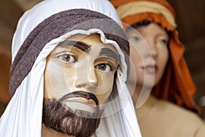 Close-up, portrait of mannequins in characteristic clothes, at the Corgnolo nativity scene, Porpetto, Udine, Friuli, Italy.