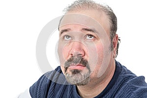 Close-up portrait of a mature man thinking